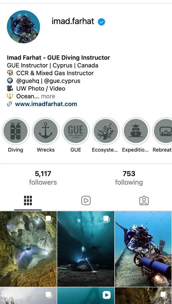 Imad Farhat Diving social media on a phone