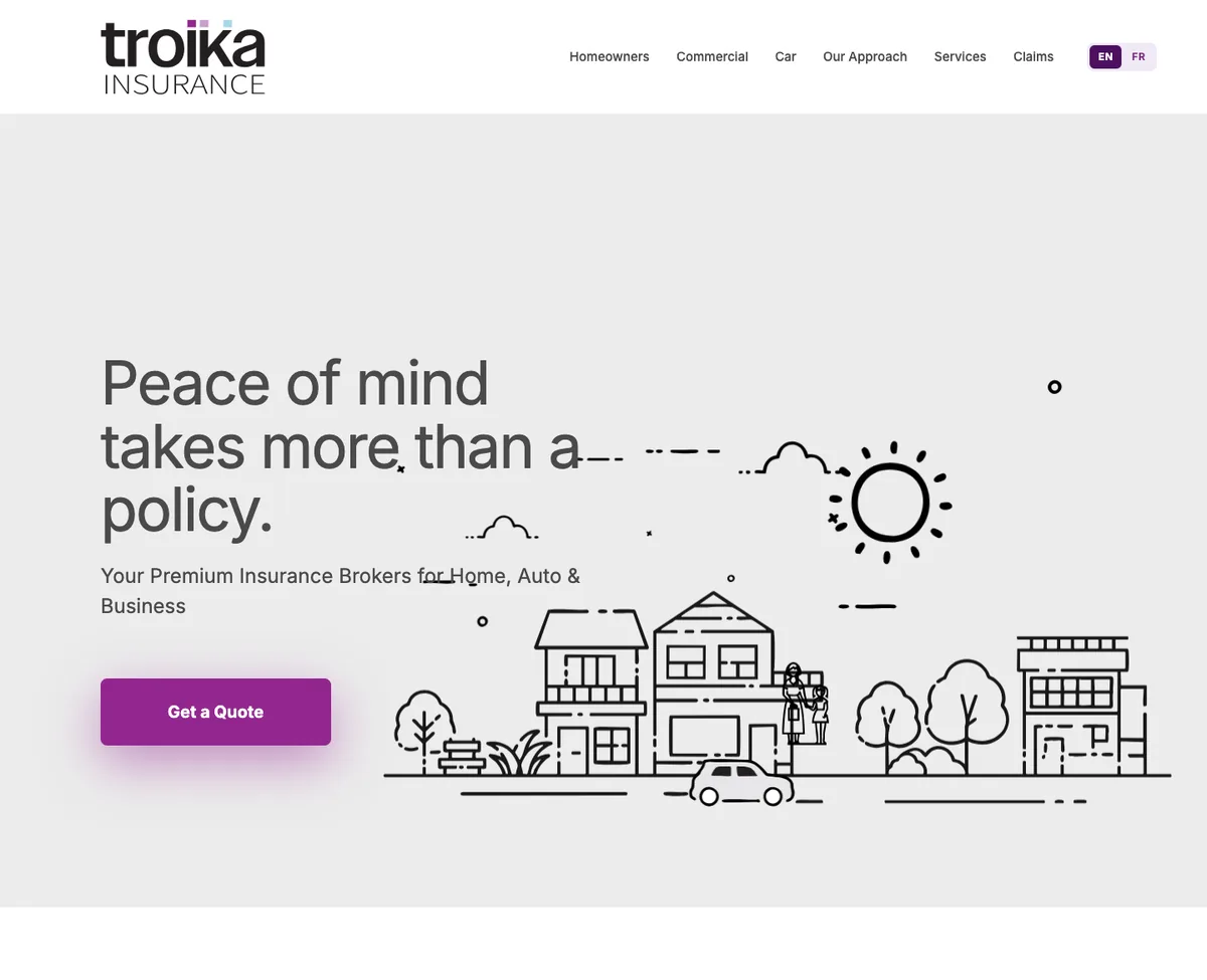 Troika Insurance website on a laptop